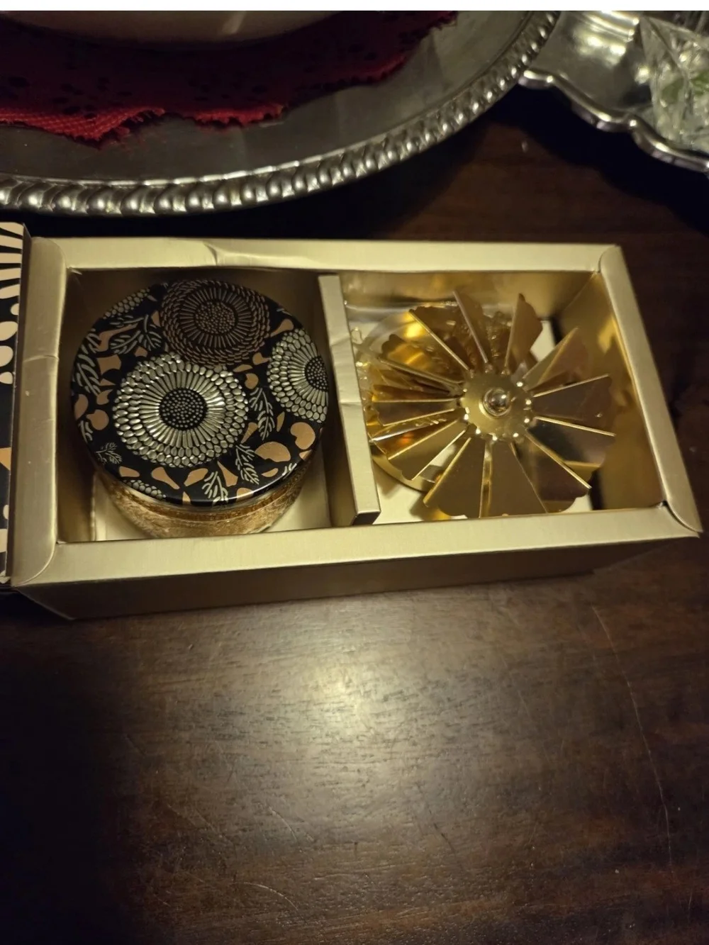 Mecela Golden Spinning Candle Holder, featuring hanging metallic fairies